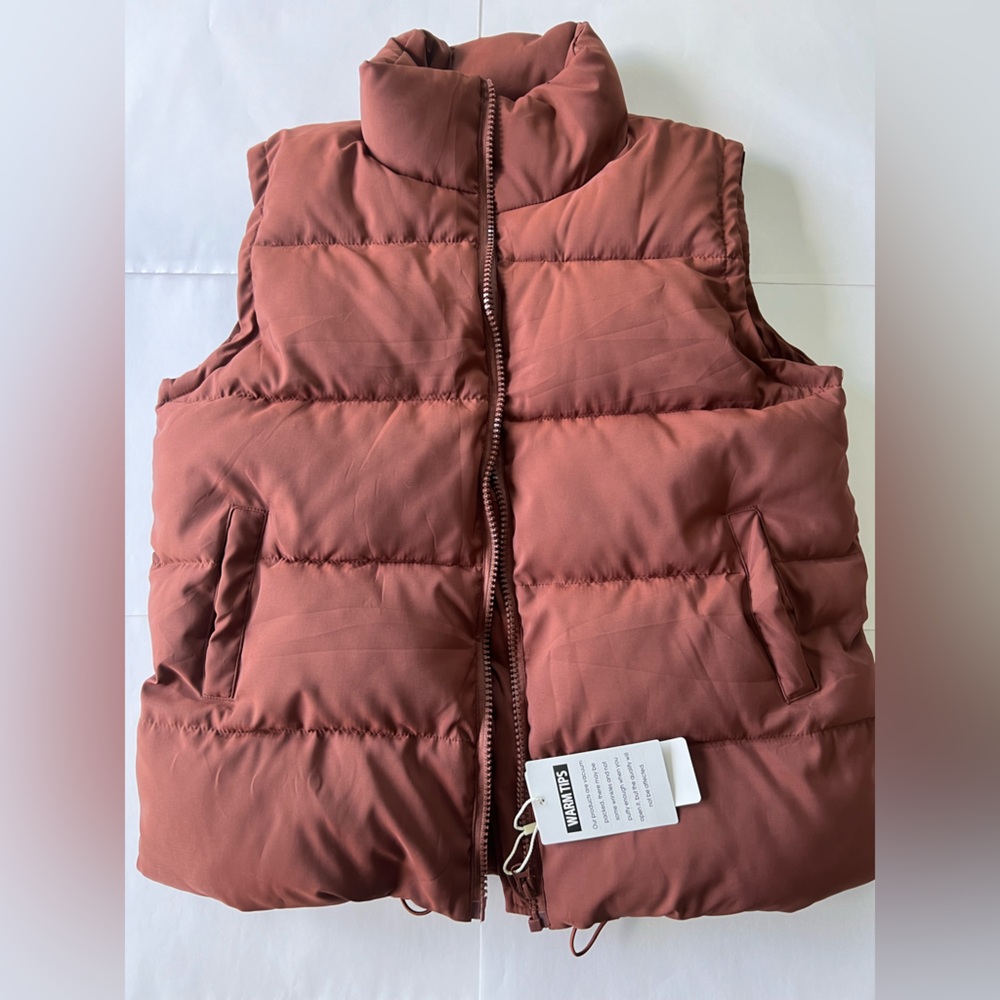 NWT vests athlisan
